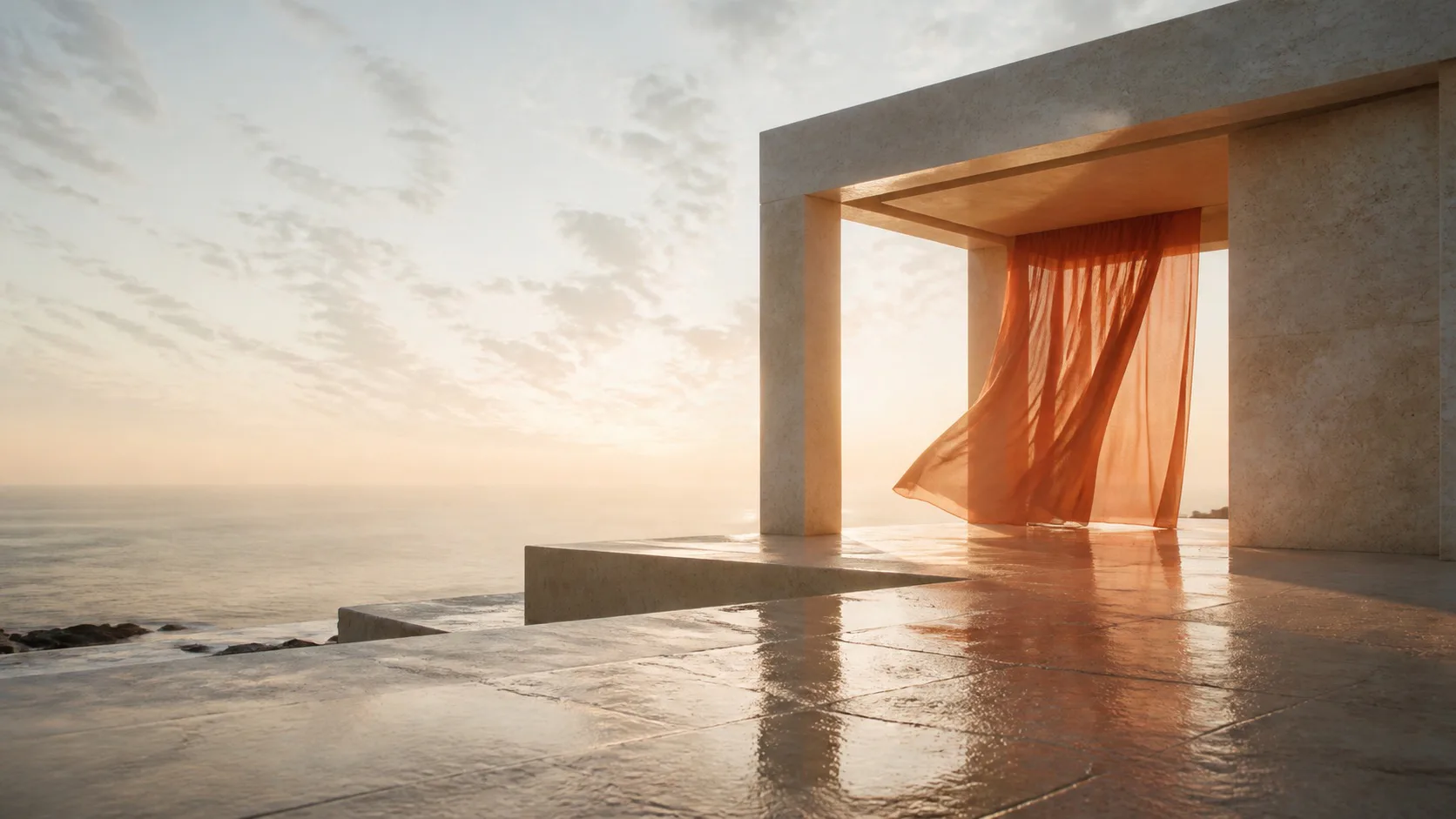 Open stone pavilion and orange curtain above a calm coast at sunrise